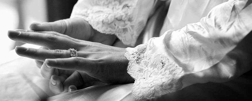 bride wearing engagement ring